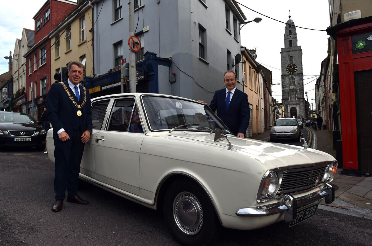 Then lord mayor of Cork Tony Fitzgerald and Fianna Fáil leader Micheál Martin in October 2017 with Jack Lynch's white Cortina, a 1967 Mark II model, prior to the naming of Jack Lynch Avenue at the North Monastery campus. Picture: Eddie O'Hare Then lord mayor of Cork Tony Fitzgerald and Fianna Fáil leader Micheál Martin in October 2017 with Jack Lynch's white Cortina, a 1967 Mark II model, prior to the naming of Jack Lynch Avenue at the North Monastery campus. Picture: Eddie O'Hare
