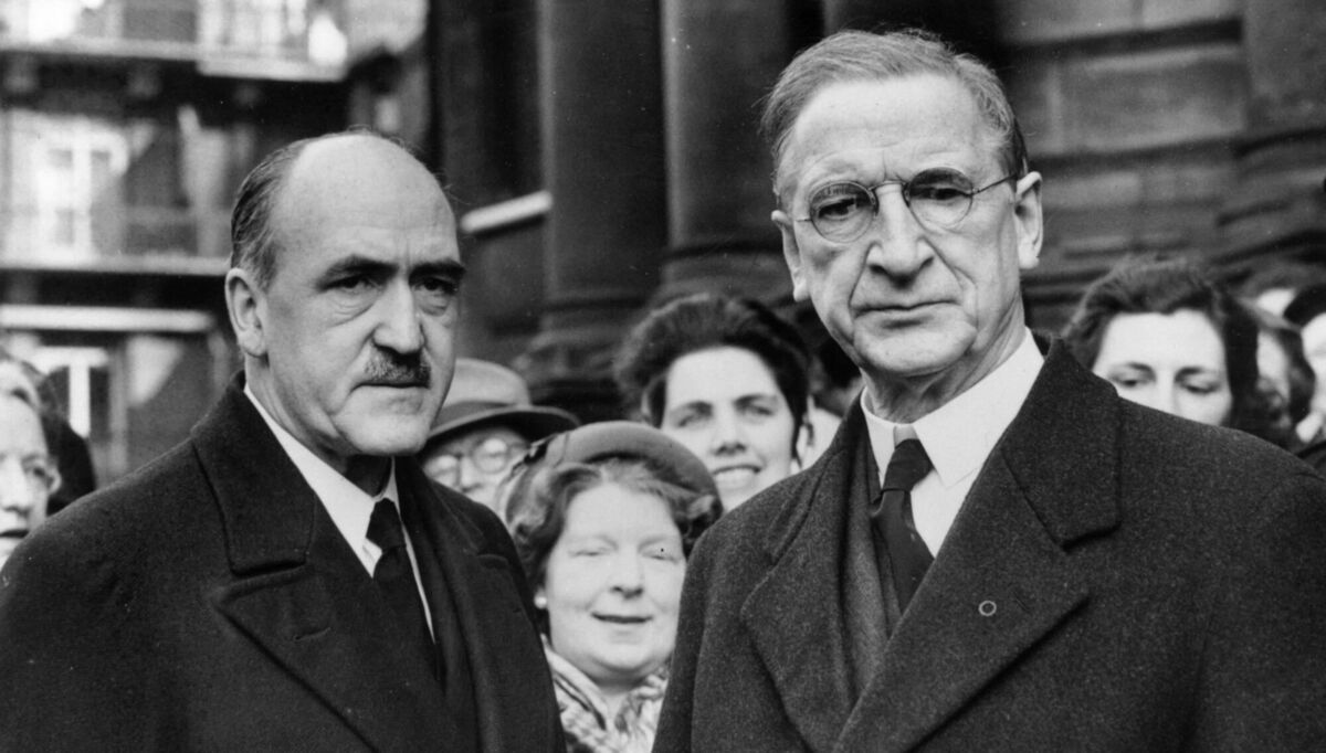 Then defence minister Frank Aiken with taoiseach Éamon de Valera in 1955. Leading statesmen from Fine Gael and Fianna Fáil including Aiken, Richard Mulcahy, Seán Mac Eoin, and Seán Moylan, were responsible for the execution and secret burial of political opponents in the War of Independence and Civil War period. Picture: Sean Sexton/Getty Then defence minister Frank Aiken with taoiseach Éamon de Valera in 1955. Leading statesmen from Fine Gael and Fianna Fáil including Aiken, Richard Mulcahy, Seán Mac Eoin, and Seán Moylan, were responsible for the execution and secret burial of political opponents in the War of Independence and Civil War period. Picture: Sean Sexton/Getty