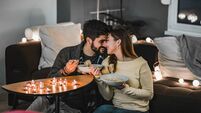 Young couple celebrating Valentine's Day indoors