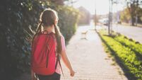 Girl walking to school