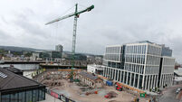 Crane signals start of build of first major docklands apartment block in Cork