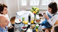 Happy Family Having Breakfast together, Overhead View