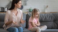 Stubborn upset little daughter ignoring strict mother, family conflict