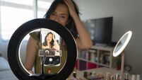 influencer live streaming her cosmetic review and recommendation online