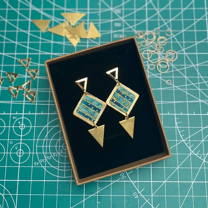 Gold and green leather and fabric earrings, €38. gillyggdesigns.com Gold and green leather and fabric earrings, €38. gillyggdesigns.com