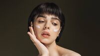 Cream on face. Scin care. Beauty portrait. Woman