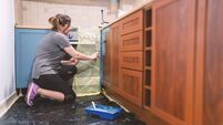 Painting kitchen.