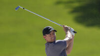 McIlroy trails by one as Lowry looms