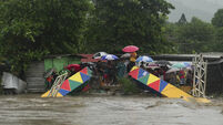 Flash floods and mudslides threat as tropical storm drenches Honduras