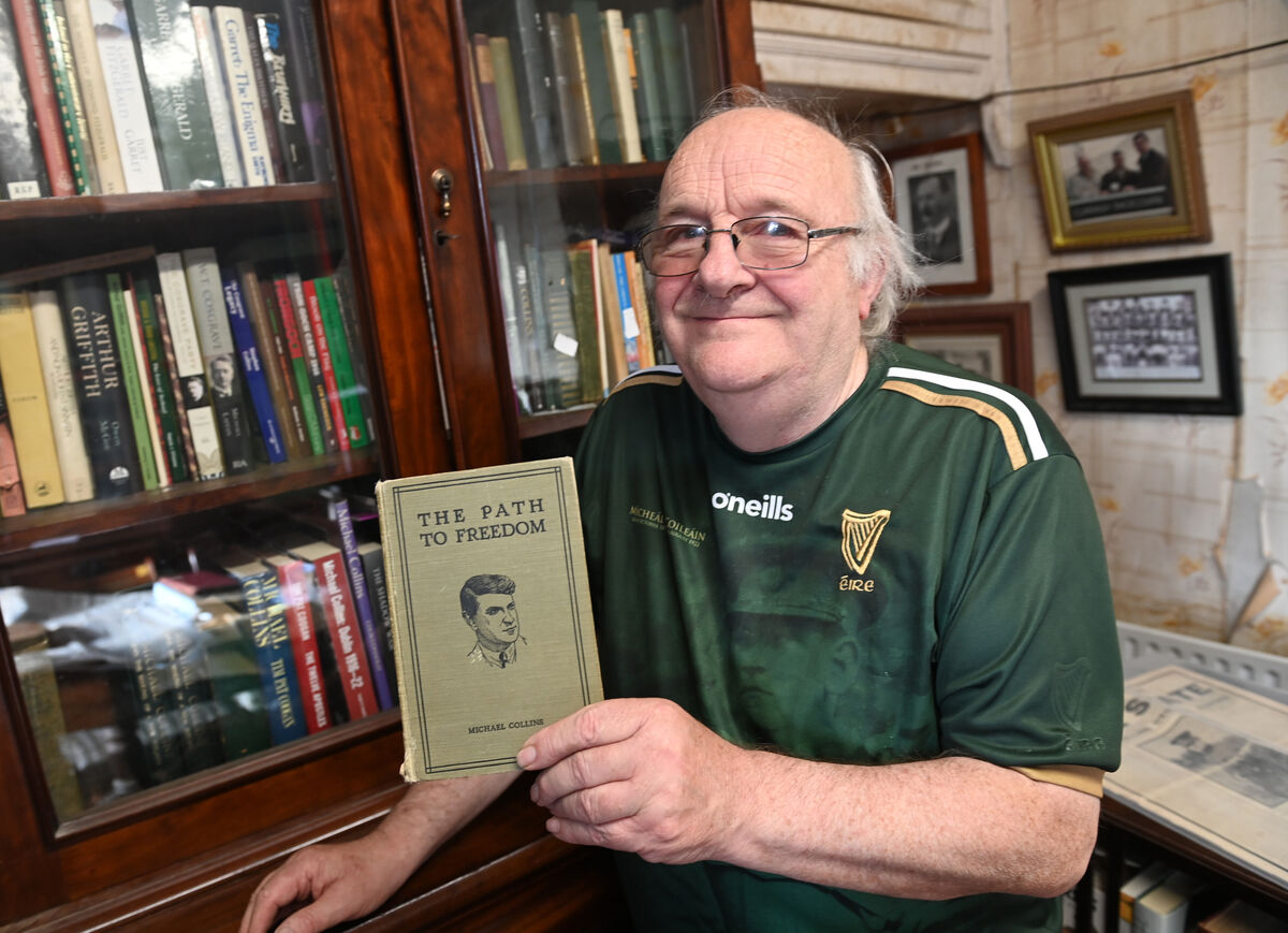 Noel Scannell with 'The Path to Freedom' by Michael Collins, part of his extensive collection of Michael Collins memorabilia. Picture: Larry Cummins Noel Scannell with 'The Path to Freedom' by Michael Collins, part of his extensive collection of Michael Collins memorabilia. Picture: Larry Cummins
