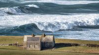 Rough Sea and a Lonely Cottage
