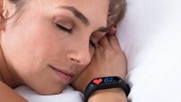 Fitness Activity Tracker On Woman's Hand
