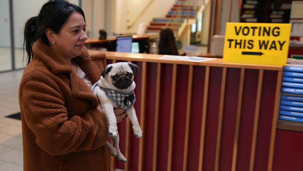 Sonia Higgins, with her dog Chico, arrives to cast her vote at Deaf Village Ireland (DVI) on the Navan Road in Dublin. Picture: Brian Lawless/PA Wire Sonia Higgins, with her dog Chico, arrives to cast her vote at Deaf Village Ireland (DVI) on the Navan Road in Dublin. Picture: Brian Lawless/PA Wire