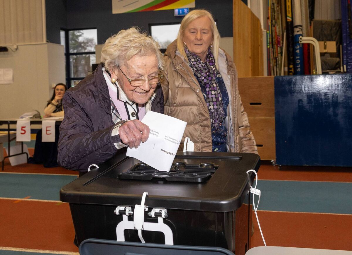 On her 100th birthday, Bridget Delaney from Carlow Town accompanied by her daughter Phil casts her vote at the polling station in the St Laurence O’Toole AC in Carlow Picture: Michael O'Rourke Photography On her 100th birthday, Bridget Delaney from Carlow Town accompanied by her daughter Phil casts her vote at the polling station in the St Laurence O’Toole AC in Carlow Picture: Michael O'Rourke Photography