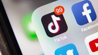 TikTok and Facebook application  on screen Apple iPhone XR