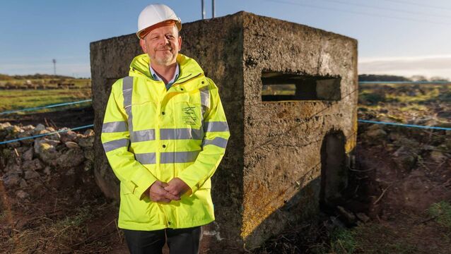 <p>Mayor of Limerick John Moran at one of the historic pillboxes unearthed by archaeologists at Askeaton, Co Limerick, during work on the construction of the Foynes-Limerick road. </p>