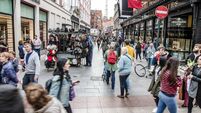 Crowd on Grafton Street in Dublin during day of autumn