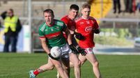 Noel McGrath in action against Aaron Fitzgerald and Luke Pynne 24/11/2024