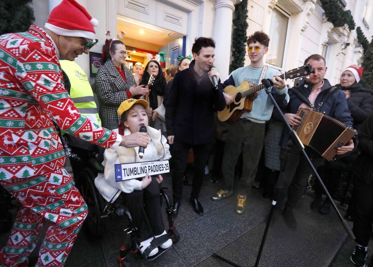 Jenny Keane, aged 16, performs alongside the Tumbling Paddies at the Temple Street christmas lights event. Picture: Mark Stedman Jenny Keane, aged 16, performs alongside the Tumbling Paddies at the Temple Street christmas lights event. Picture: Mark Stedman